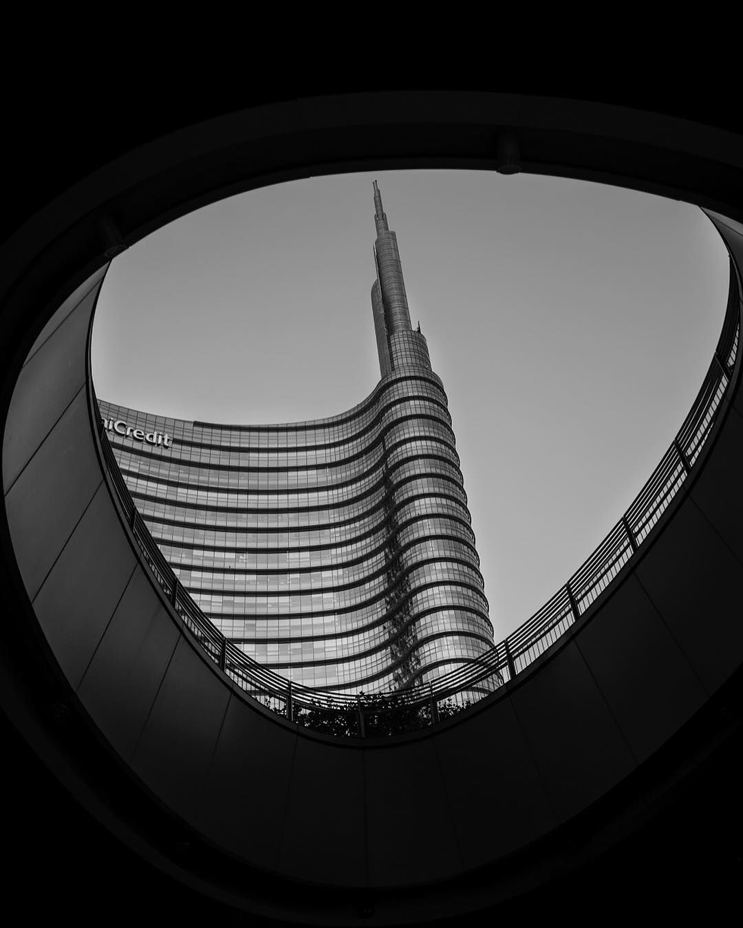 UniCredit Tower in Milan seen from below in black and white
